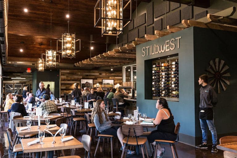 Brewery restaurant with industrial seating and lantern pendants