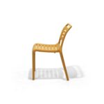 Cala Chair in Mustard, side view – poly-molded outdoor chair