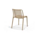 Ribbon Chair in Dune, rear three quarter view – poly-molded outdoor chair