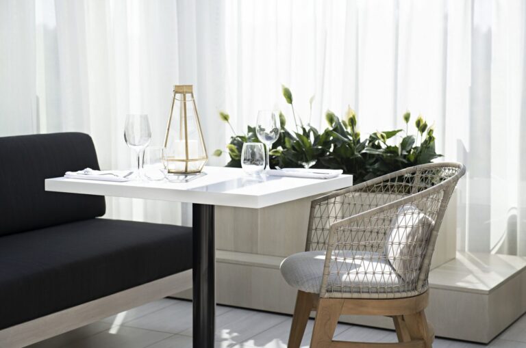 Sunroom dining at the Arbutus Club Fireside Grill in Vancouver, BC, furnished by Designform