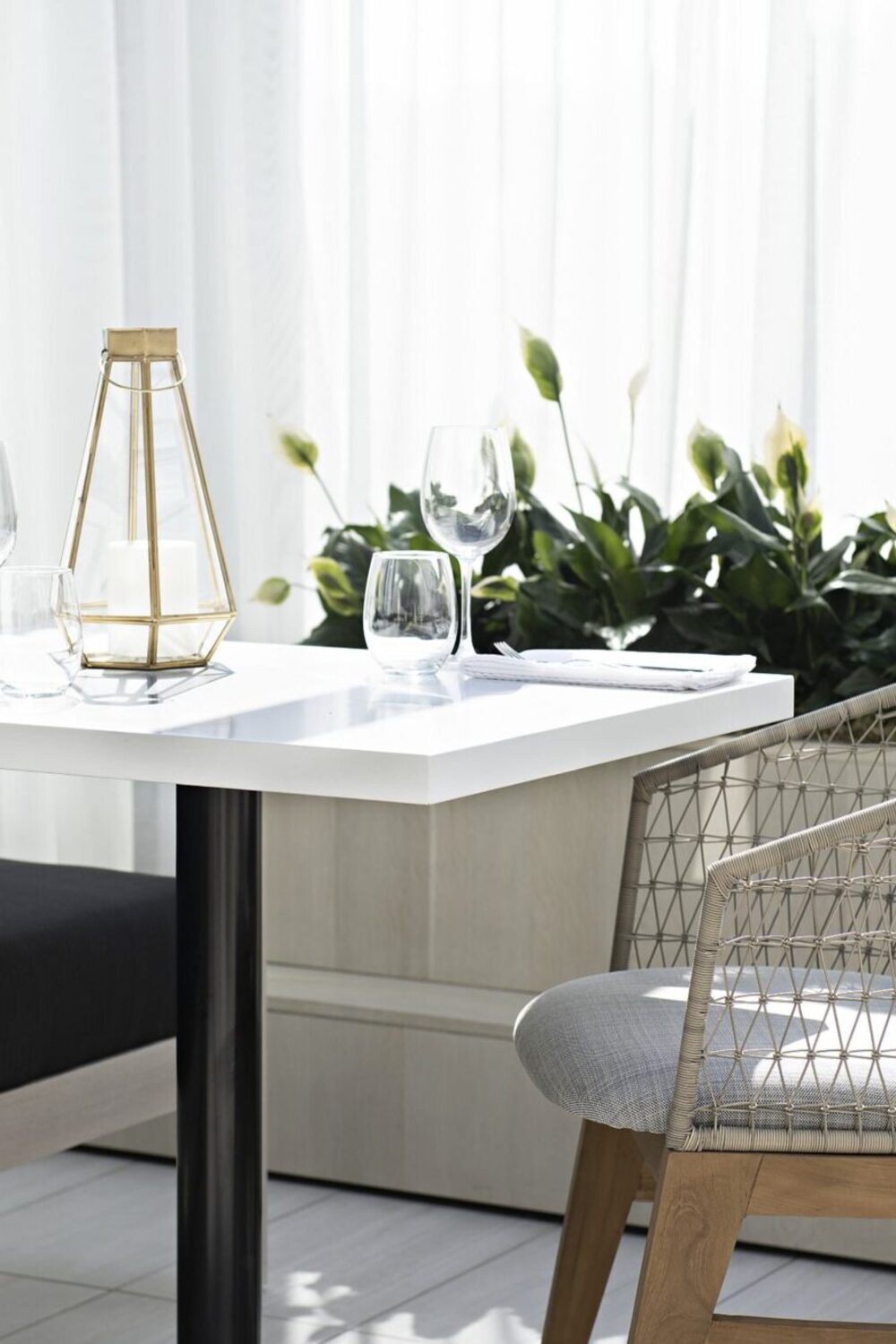 Andria chairs from the Al Fresco Collection in the indoor sunroom dining room at the Arbutus Club, Vancouver