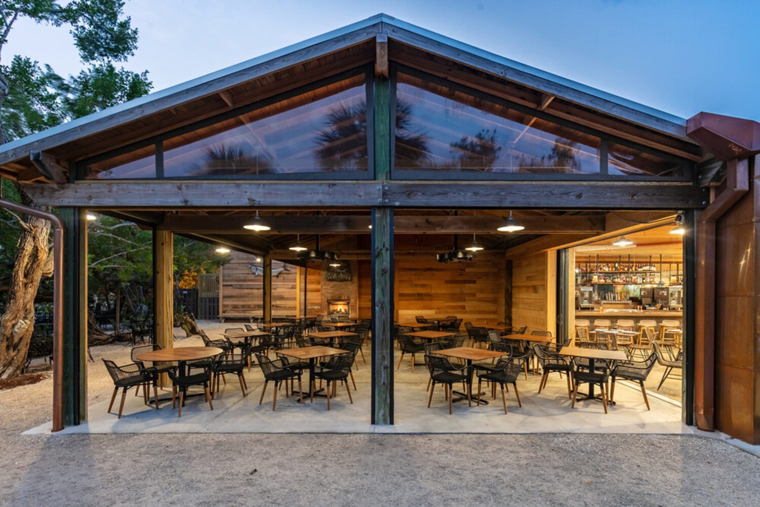 Covered outdoor dining terrace furnished with Al Fresco seating