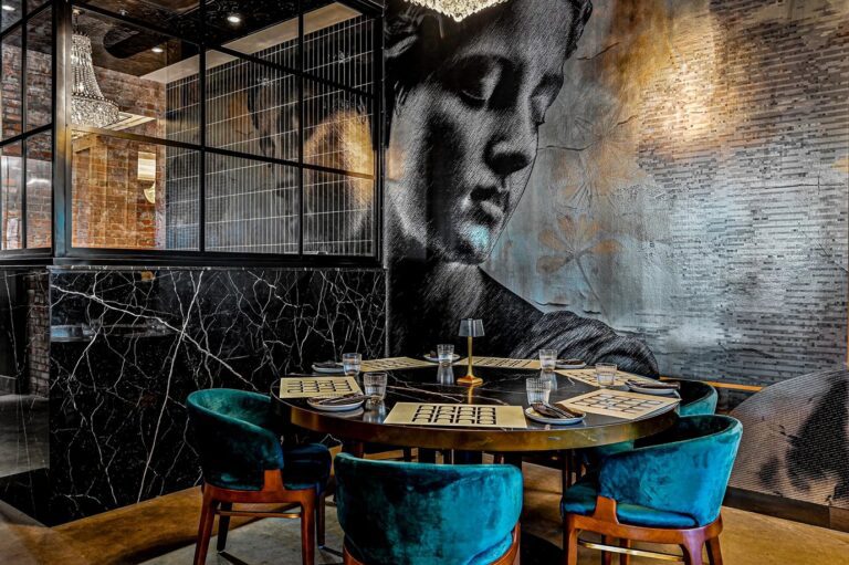 Round table with Designform Gabrielle chairs at Nero, Edmonton, AB