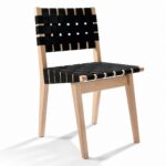 Weaver Chair three-quarter view with white woven webbing seat and back on a walnut frame